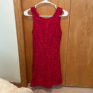 Red dress. Above knees.